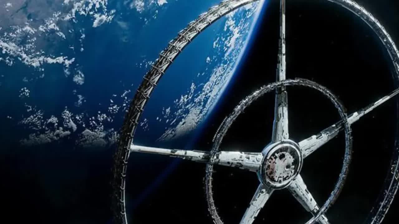 人类未来，穷人留在地球忍受痛苦，富人则在移民空间站享受生活